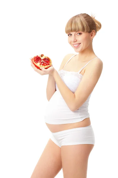 Mulher grávida com romã — Fotografia de Stock