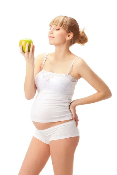 Mujer embarazada con manzana —  Fotos de Stock