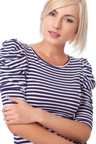 Blonde woman wearing striped dress — Stockfoto