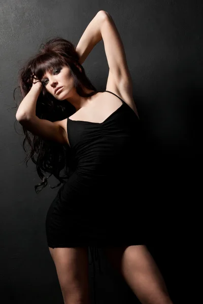 Woman posing wearing black dress — Stock Photo, Image
