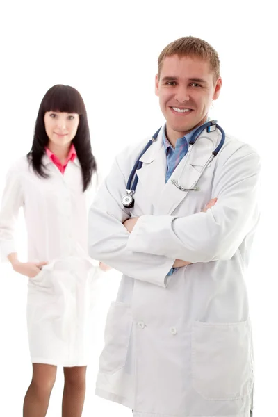 Frau und Mann Ärzte über weiß — Stockfoto