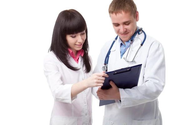 Женщина и мужчина врачи над белым — стоковое фото