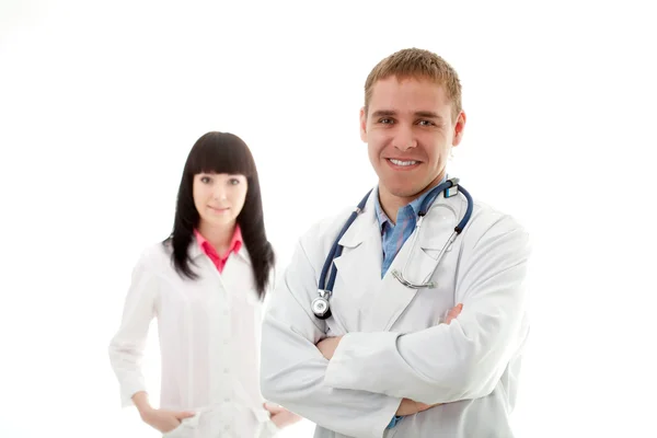 Mujer y hombre médicos sobre blanco — Foto de Stock