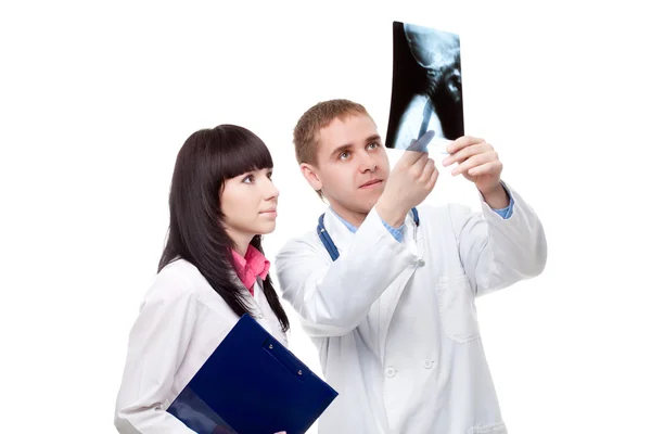 Женщина и мужчина врачи над белым — стоковое фото