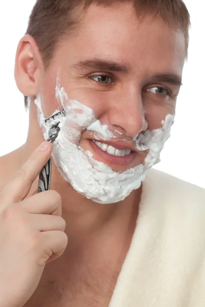 Vonzó férfi arcát borotválkozás — Stock Fotó