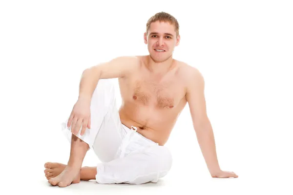 Człowiek sobie białe spodnie — Zdjęcie stockowe