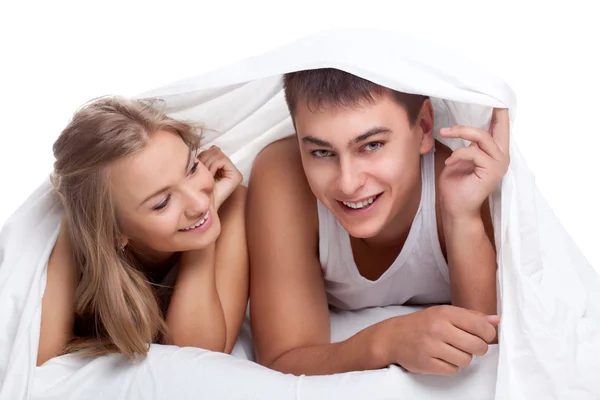 Para leżąc na łóżku biały — Zdjęcie stockowe