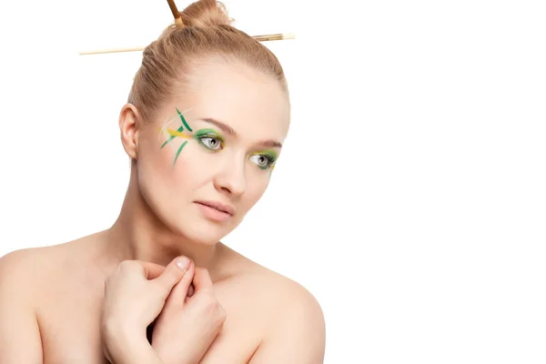 Mujer con hojas de bambú maquillaje estilo —  Fotos de Stock