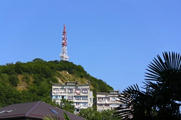 Telecommunication tower and buildings in mountains