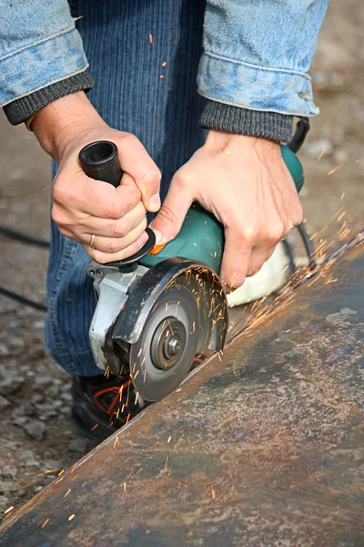 stock image A grinding wheel cuts a metal