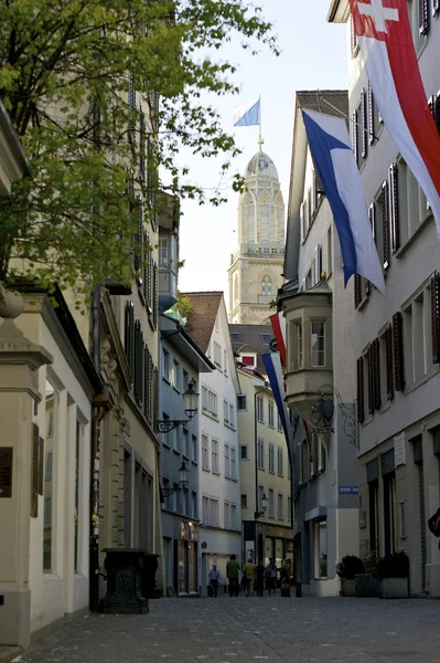 Zurich flagged old town and Grossmunster — Stock Photo, Image