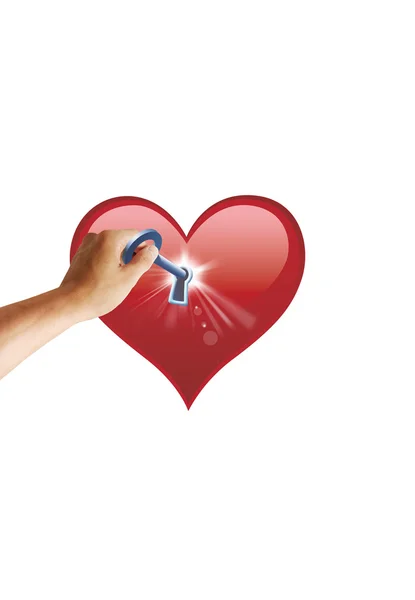 Красное сердце и ключ — стоковое фото