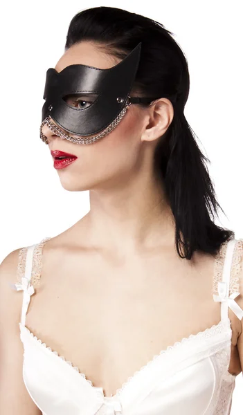 A girl in a black mask and corset — Stock Photo, Image