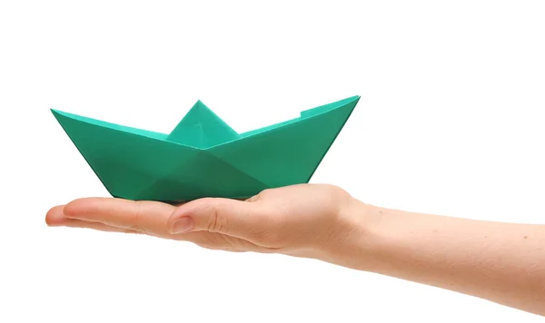 Paper ship in a female hand — Stock Photo, Image