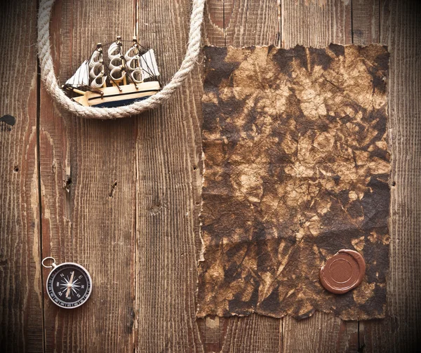 Old paper, rope and model classic boat — Stock Photo, Image