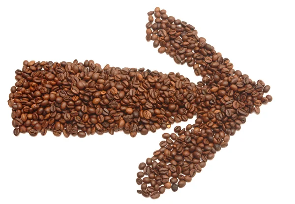 Een pijl gemaakt van koffiebonen wijzen de weg — Stockfoto