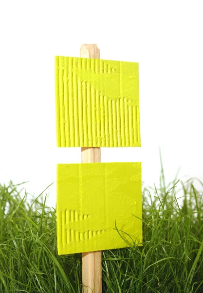 Cartel de cartón con hierba — Foto de Stock