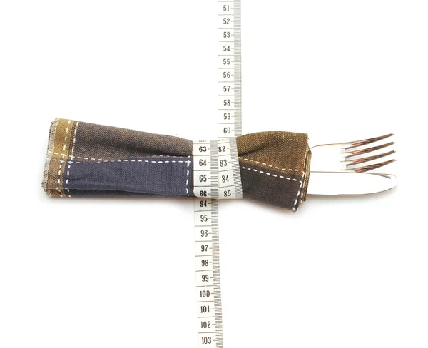 Kniv och gaffel i textil servett. kost hälsosam mat — Stockfoto
