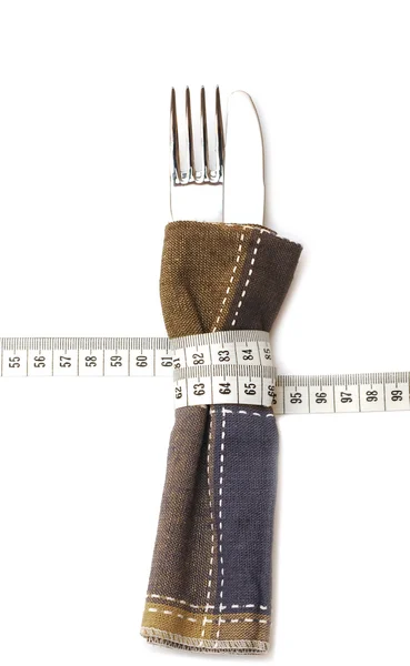 stock image Knife and fork in textile napkin. diet healthy food