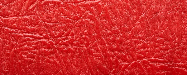 Närbild röd läder bakgrund — Stockfoto