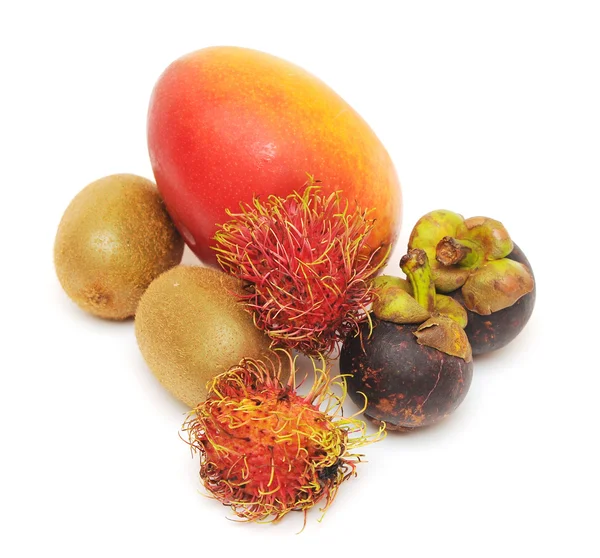 Fresh tropical fruits on white background — Stock Photo, Image