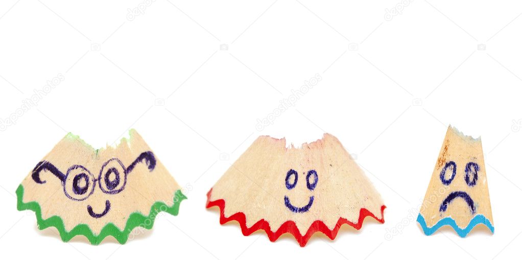 Group of pencil shavings with smile on white
