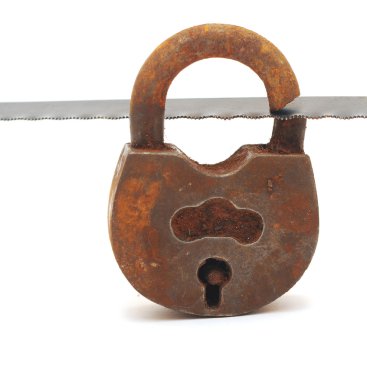 Old padlock on a white background