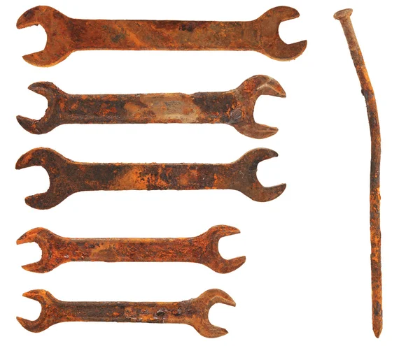 Set very old rusty wrenches and rusty nail, isolated on white ba — Stock Photo, Image