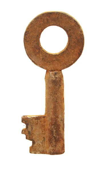 Ржавый старый ключ на белом — стоковое фото