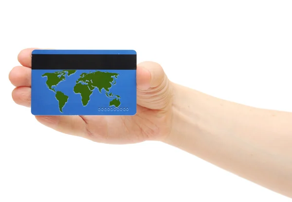 Cartão de crédito azul com mapa do mundo na mão segurando — Fotografia de Stock