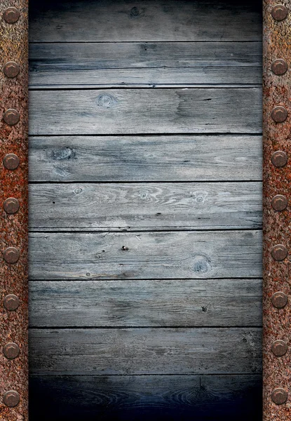 Alte Holzwand in rostiger Metallrahmenstruktur — Stockfoto
