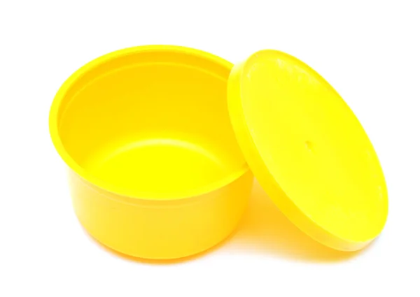 Lata de plástico amarillo sobre blanco —  Fotos de Stock