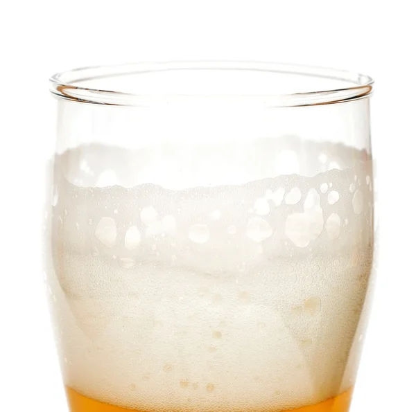 Glass of beer closeup with froth — Stock Photo, Image