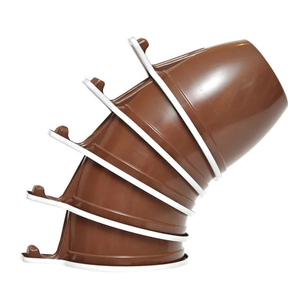 Copa de plástico marrón sobre un fondo blanco — Foto de Stock