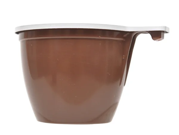 Brun plast kopp på en vit bakgrund — Stockfoto