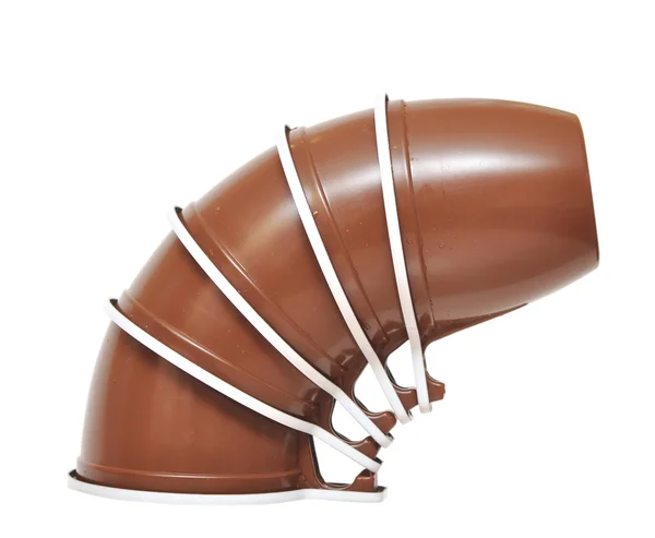 Copa de plástico marrón sobre un fondo blanco —  Fotos de Stock