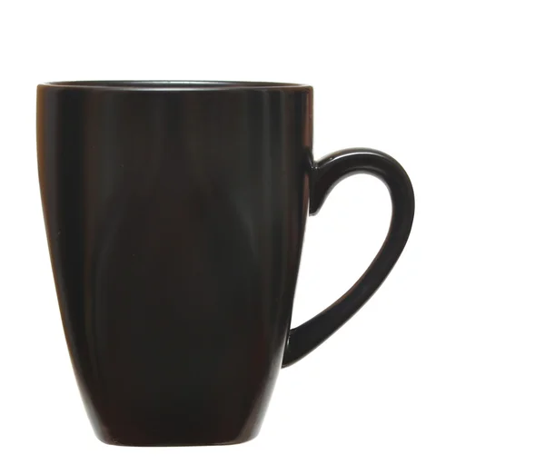 Черная чашка на белом фоне — стоковое фото
