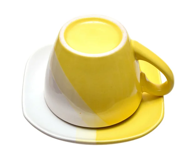 Žlutý čaj pohár na bílém pozadí — Stock fotografie
