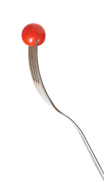 Tomato on a fork isolated on white — Stock Photo, Image