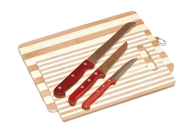 Кухонные ножи на борту — стоковое фото