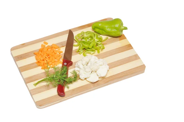 Natura morta di verdure e coltello da cucina sul tagliere — Foto Stock