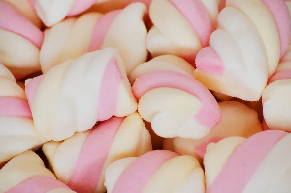 Pozadí nebo textury růžové a barevné marshmallows — Stock fotografie