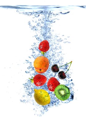 Fruit splashing into the water clipart