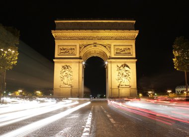 Beautiful night view of the Arc de Triomphe, Paris, France clipart