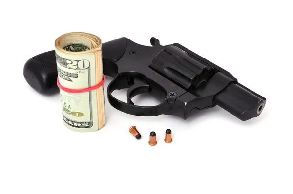 Revolver a dolary — Stock fotografie