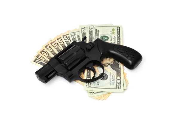 Revolver and dollars — Stock Photo, Image