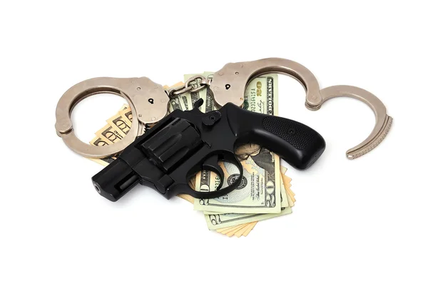 Revolver, dollars and the handcuffs — Stock Photo, Image