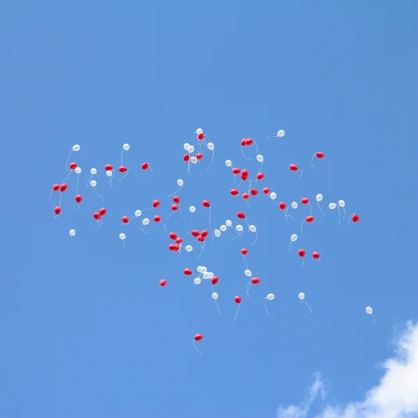stock image Fly away balloons in the sky