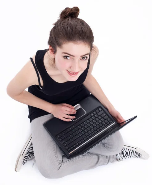 लॅपटॉपवर काम करणारी मुलगी. पांढरा पार्श्वभूमीवर चित्र . — स्टॉक फोटो, इमेज