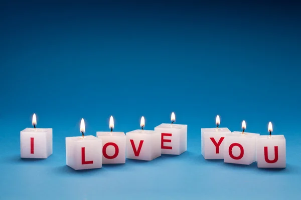 "Miluji tě "tiskne se na svíčky. — Stock fotografie